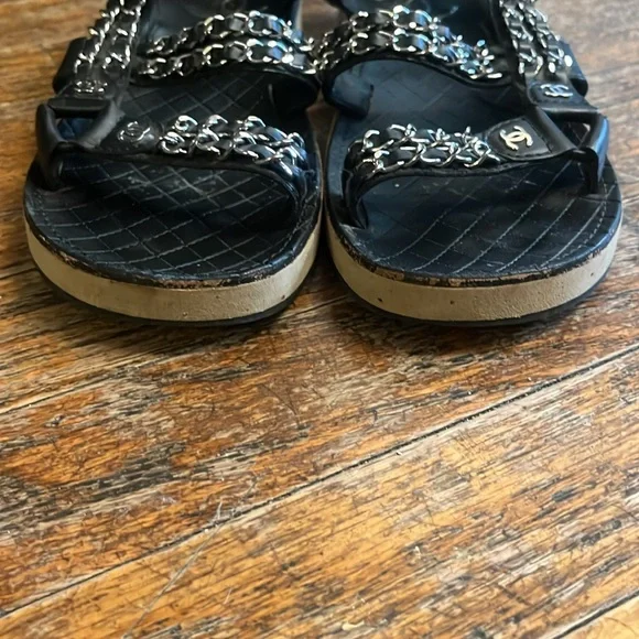 Chanel black leather and silver chain velcro logo sandals. Sandals